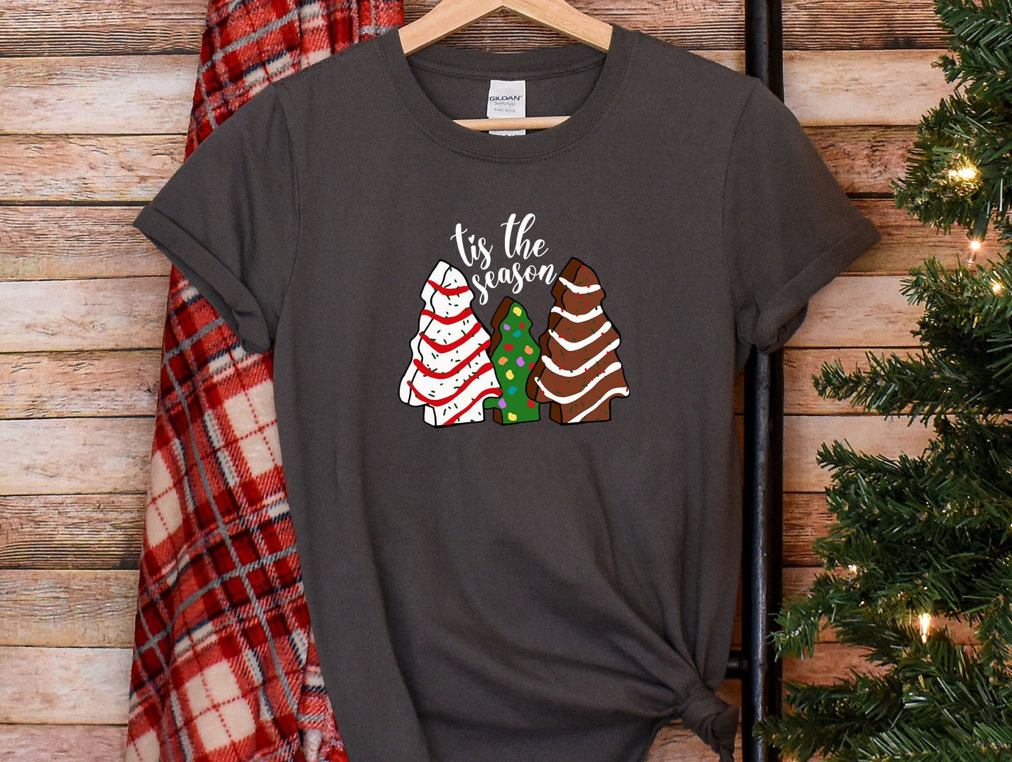 a t - shirt that says it&#39;s the season on it next to a