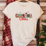a t - shirt that says grandma claus hanging on a wall