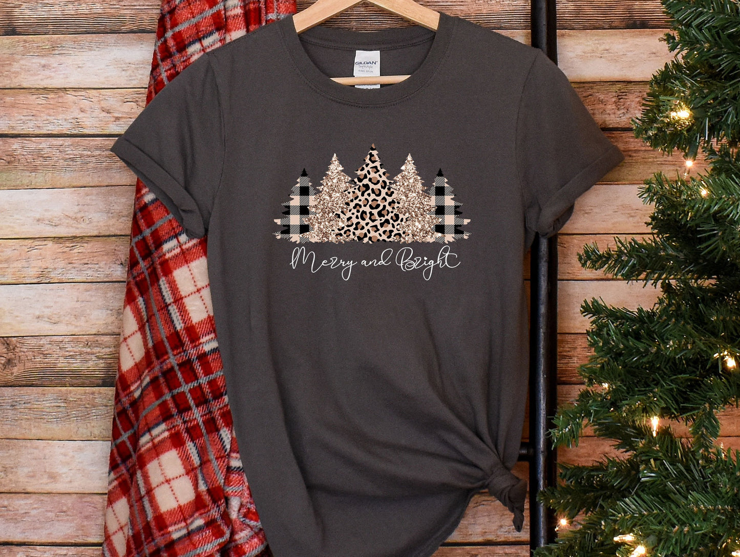 a t - shirt that says merry and bright on it