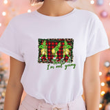 a woman wearing a white t - shirt that says i'm not going