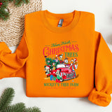 an orange shirt with a christmas tree on it