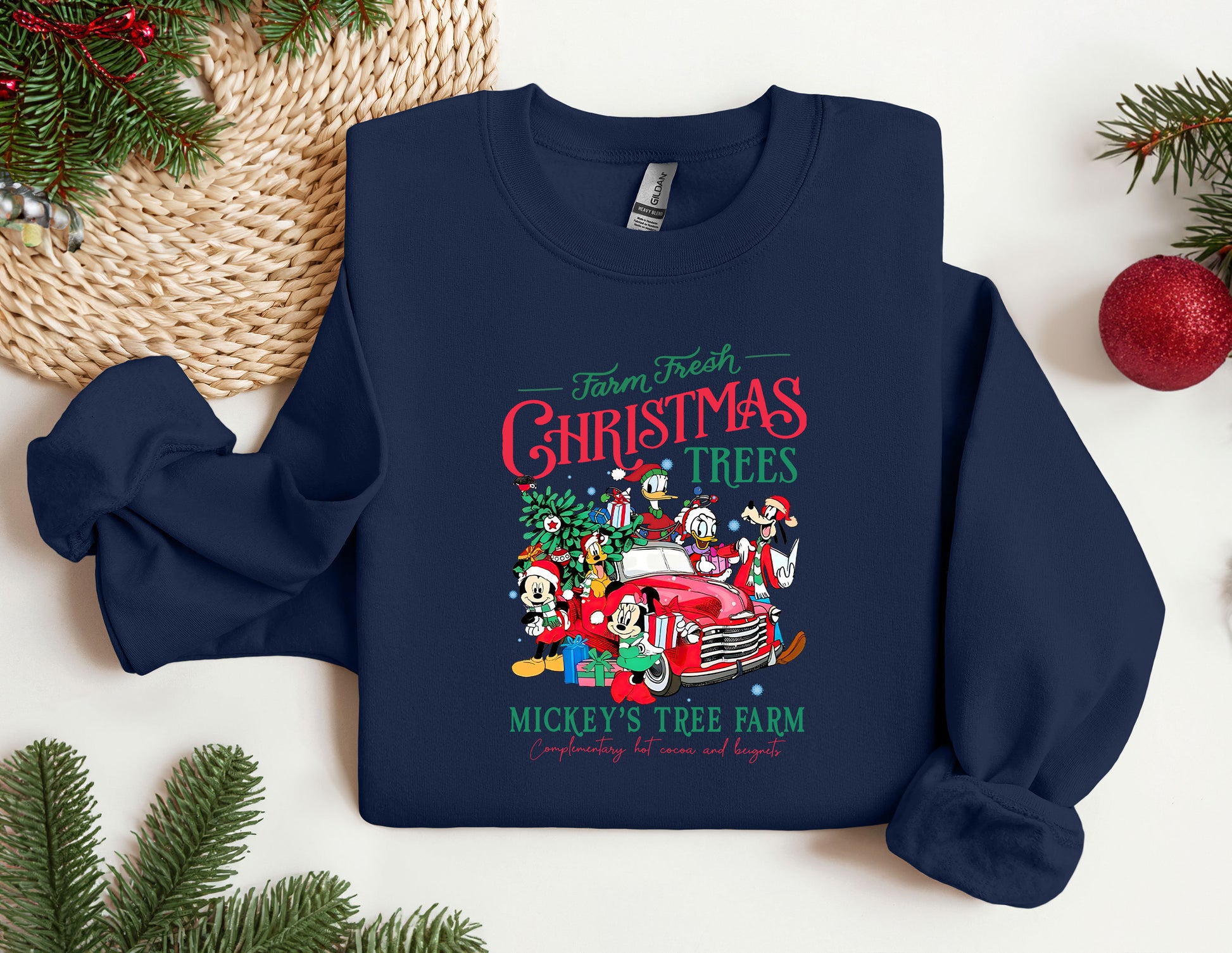 a blue christmas sweatshirt with mickey mouses tree farm on it