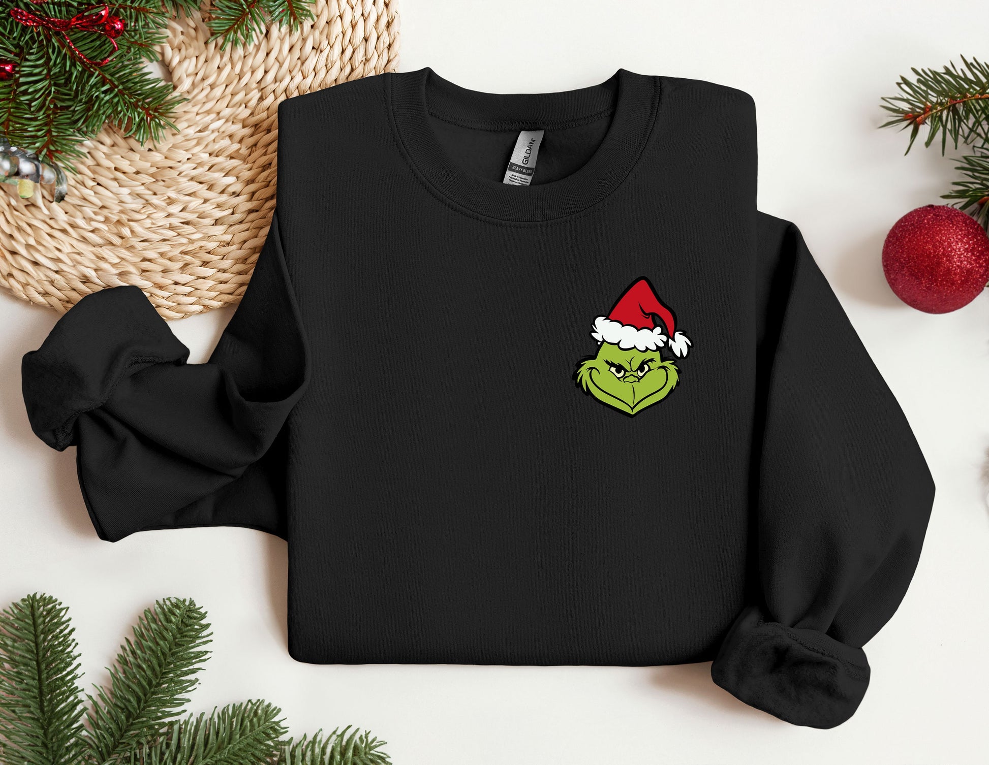 a black sweatshirt with a christmas hat on it