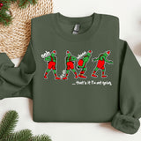 a christmas sweater with three elfs on it