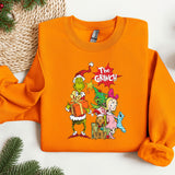 an orange shirt with a cartoon character on it