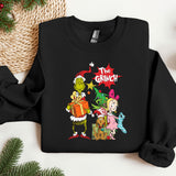 a black sweatshirt with the grinch characters on it