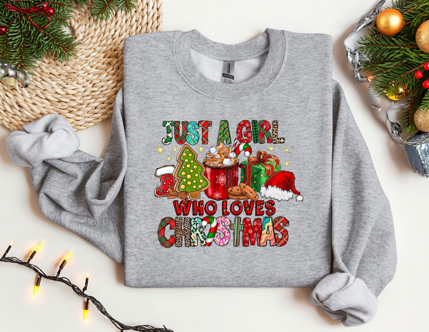 a grey sweatshirt with a christmas message on it