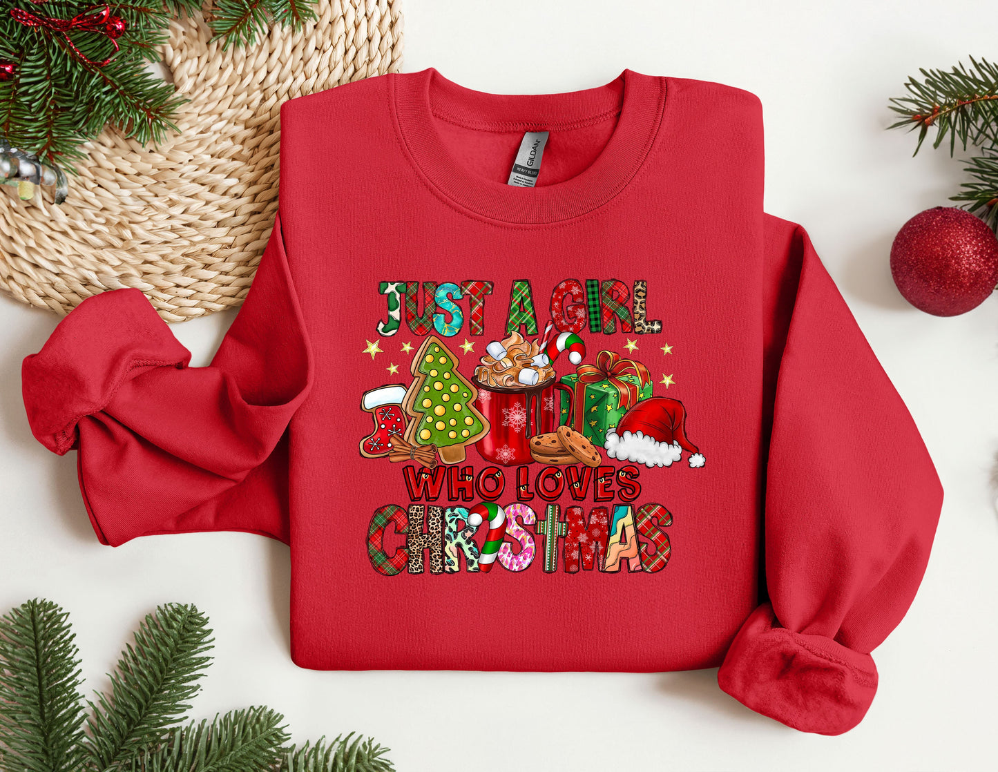 a red sweatshirt with a christmas message on it