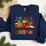 a blue sweatshirt with a christmas message on it
