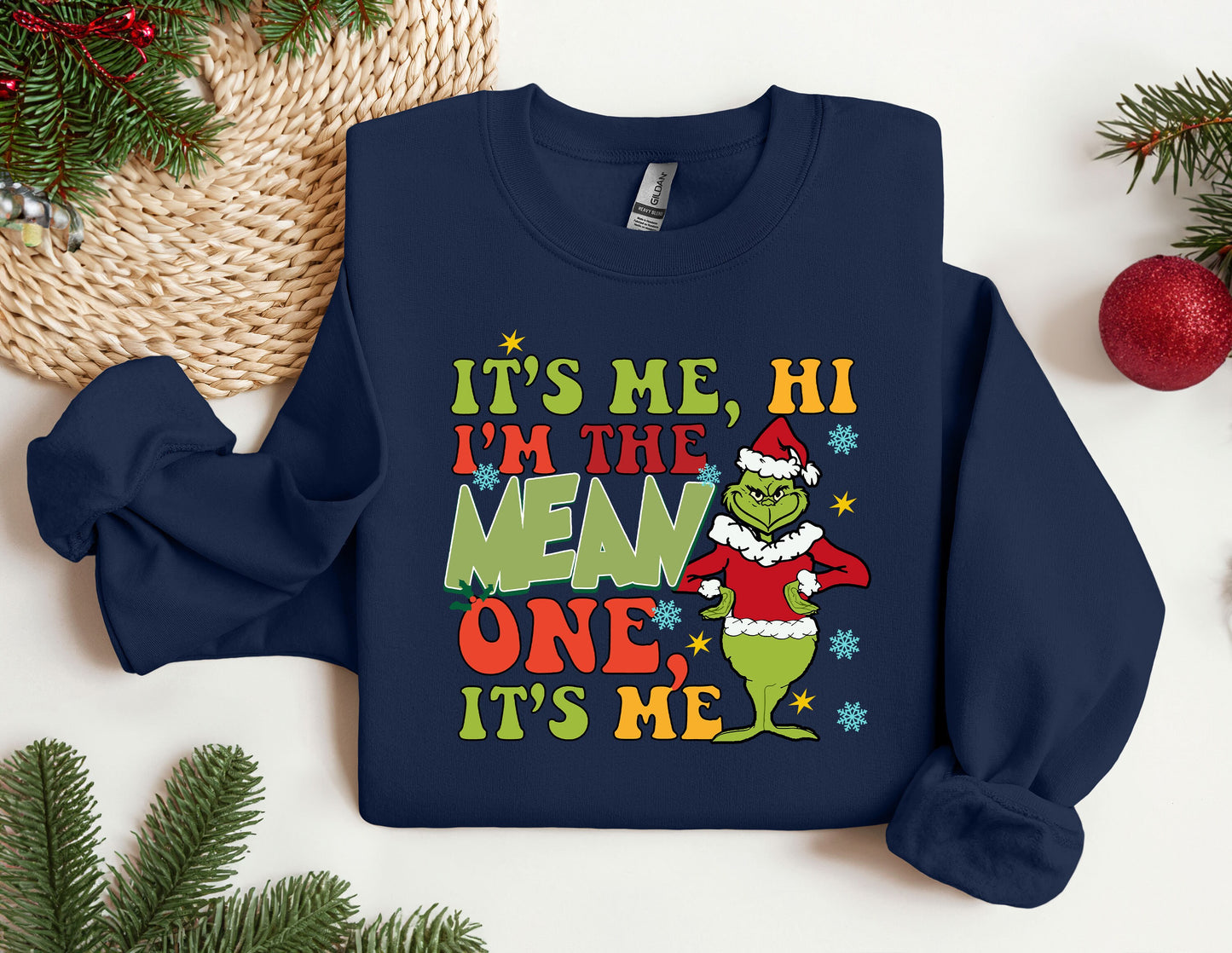 a christmas sweater with the grin on it