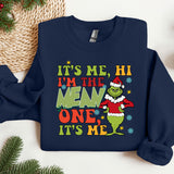 a christmas sweater with the grin on it