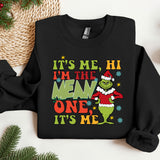 a black sweater with a grin face on it