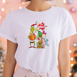 a woman wearing a white t - shirt with a cartoon character on it