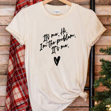 a white t - shirt with a black heart on it