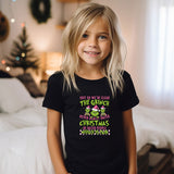 a little girl that is standing up in a room