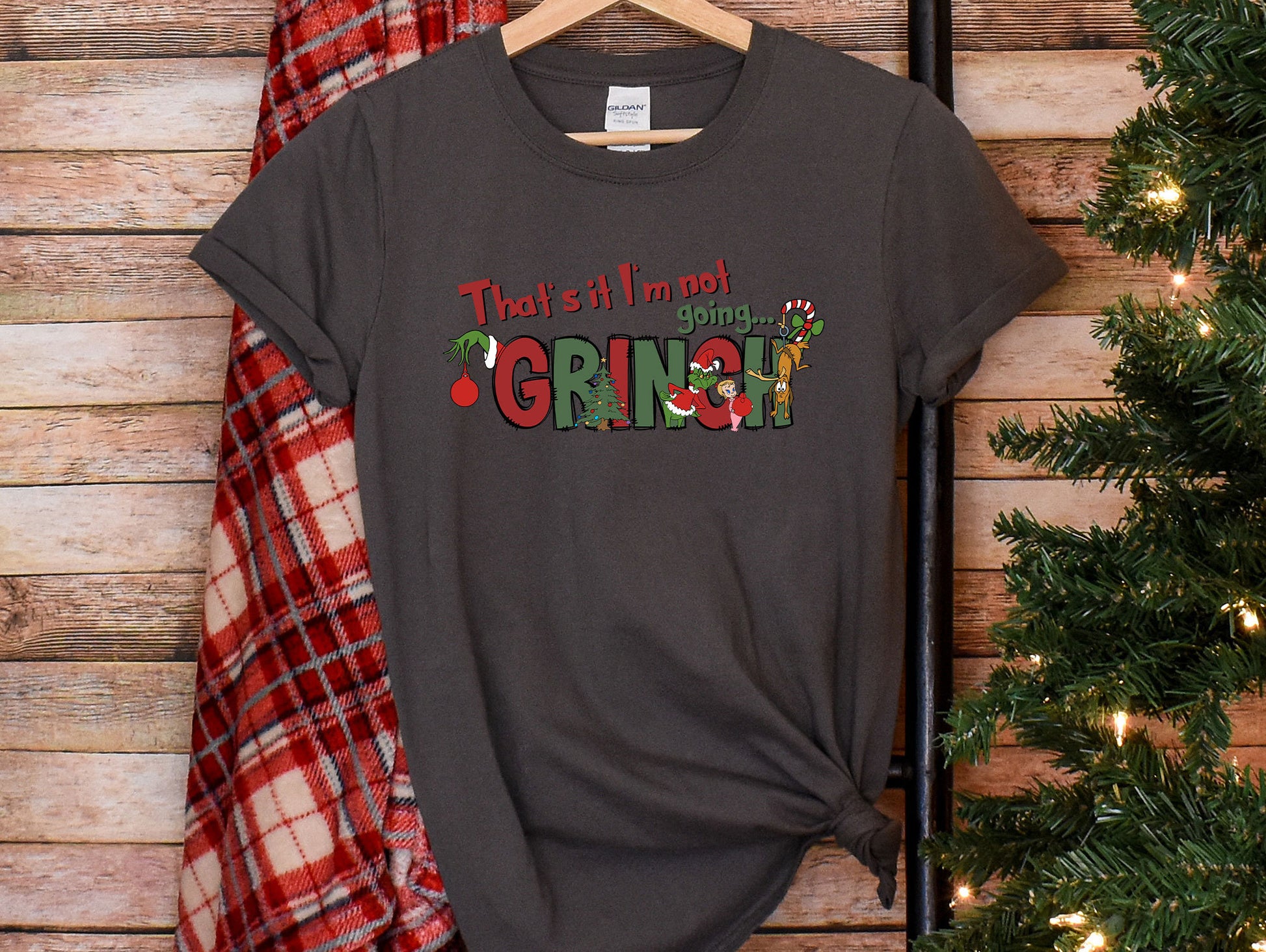 a t - shirt that says, that&#39;s all i need for christmas