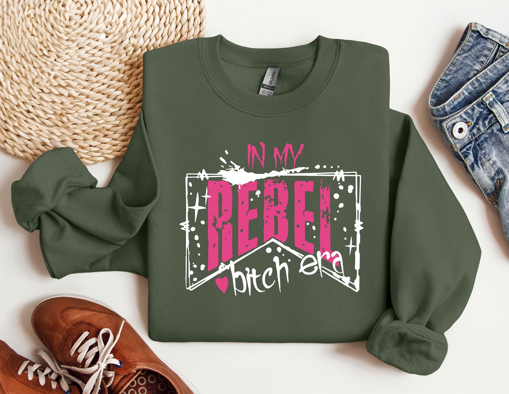 a green sweatshirt with the words in my rebel written on it