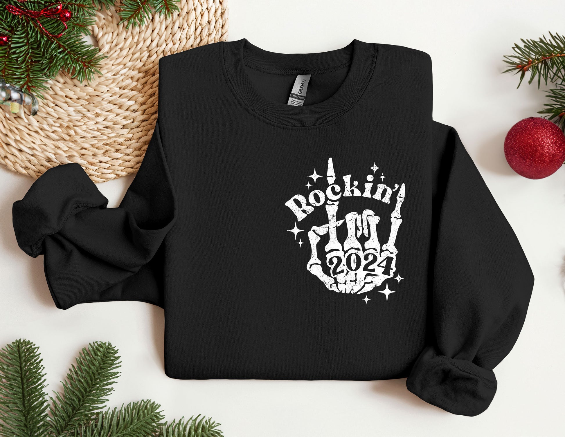 a black sweatshirt with a rockin&#39;in the 90&#39;s design on it