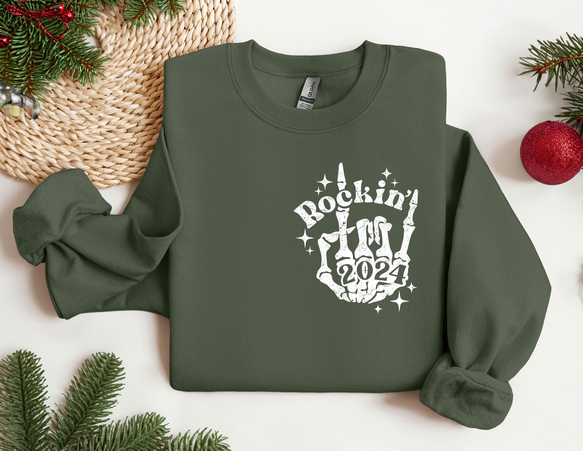 a green sweatshirt with a rockin&#39;n&#39;rollin&#39;hand on it