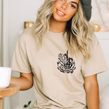 a woman sitting on a bed with a cup of coffee