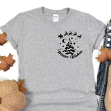 a t - shirt with a christmas tree and santa's sleigh on