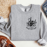 a gray sweatshirt with a black and white graphic on it