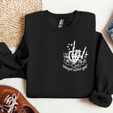 a black sweatshirt with a white design on it