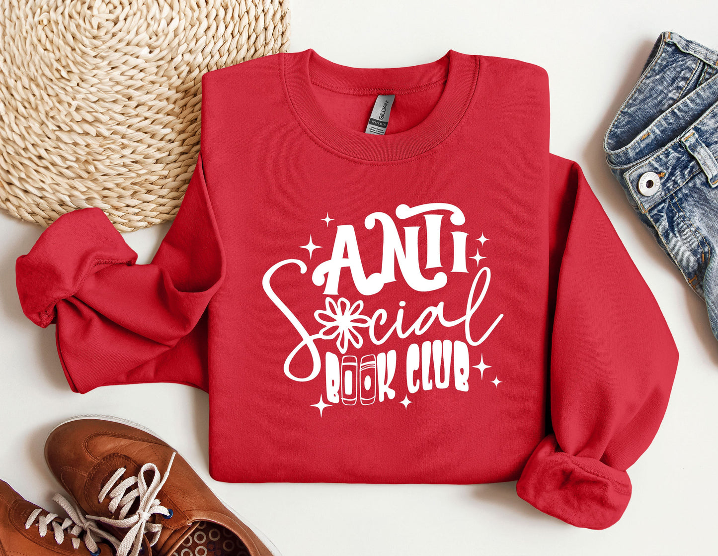 a red sweatshirt with the words anti social club on it