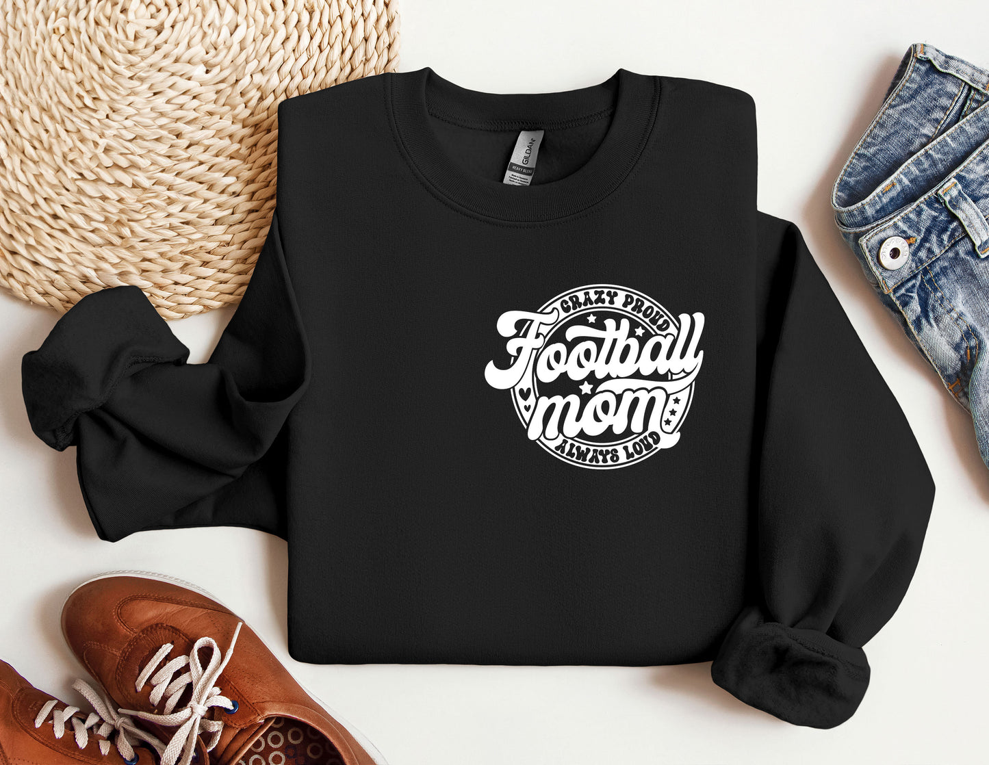 a black sweatshirt with the words football mom on it