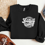 a black sweatshirt with the words football mom on it