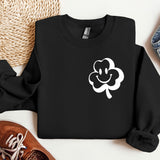 a black sweatshirt with a white clover on it