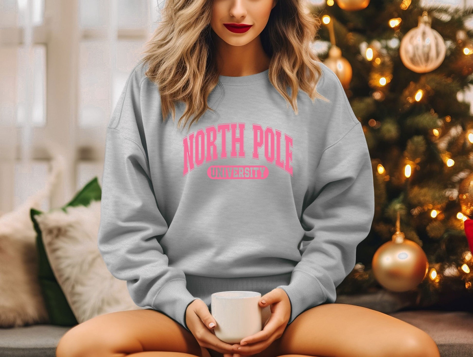 a woman sitting on a couch holding a coffee mug