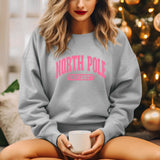 a woman sitting on a couch holding a coffee mug
