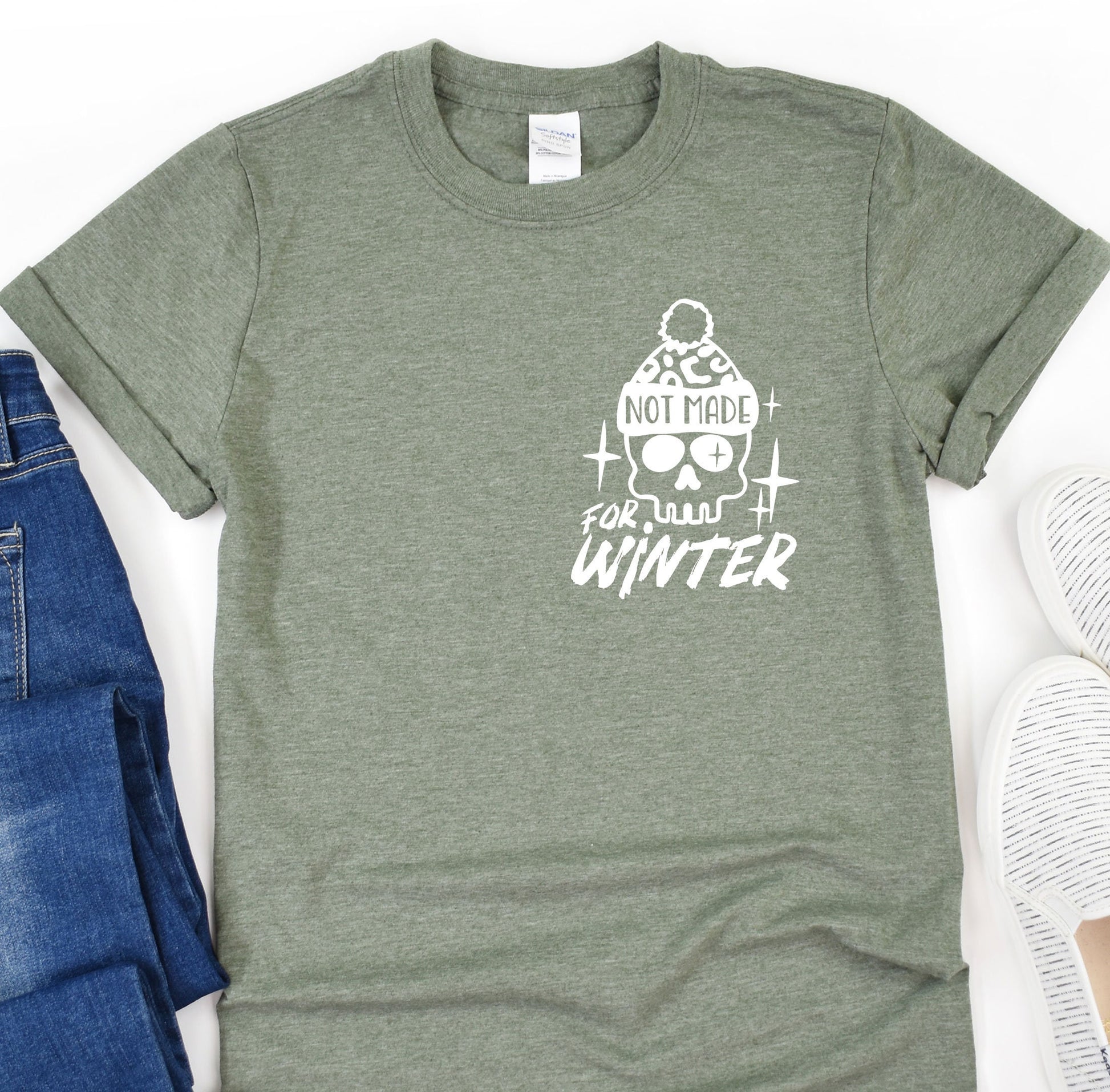 a t - shirt that says not today for winter next to a pair of jeans