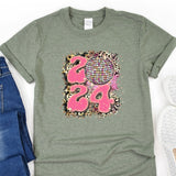 a t - shirt with a design on it next to a pair of jeans