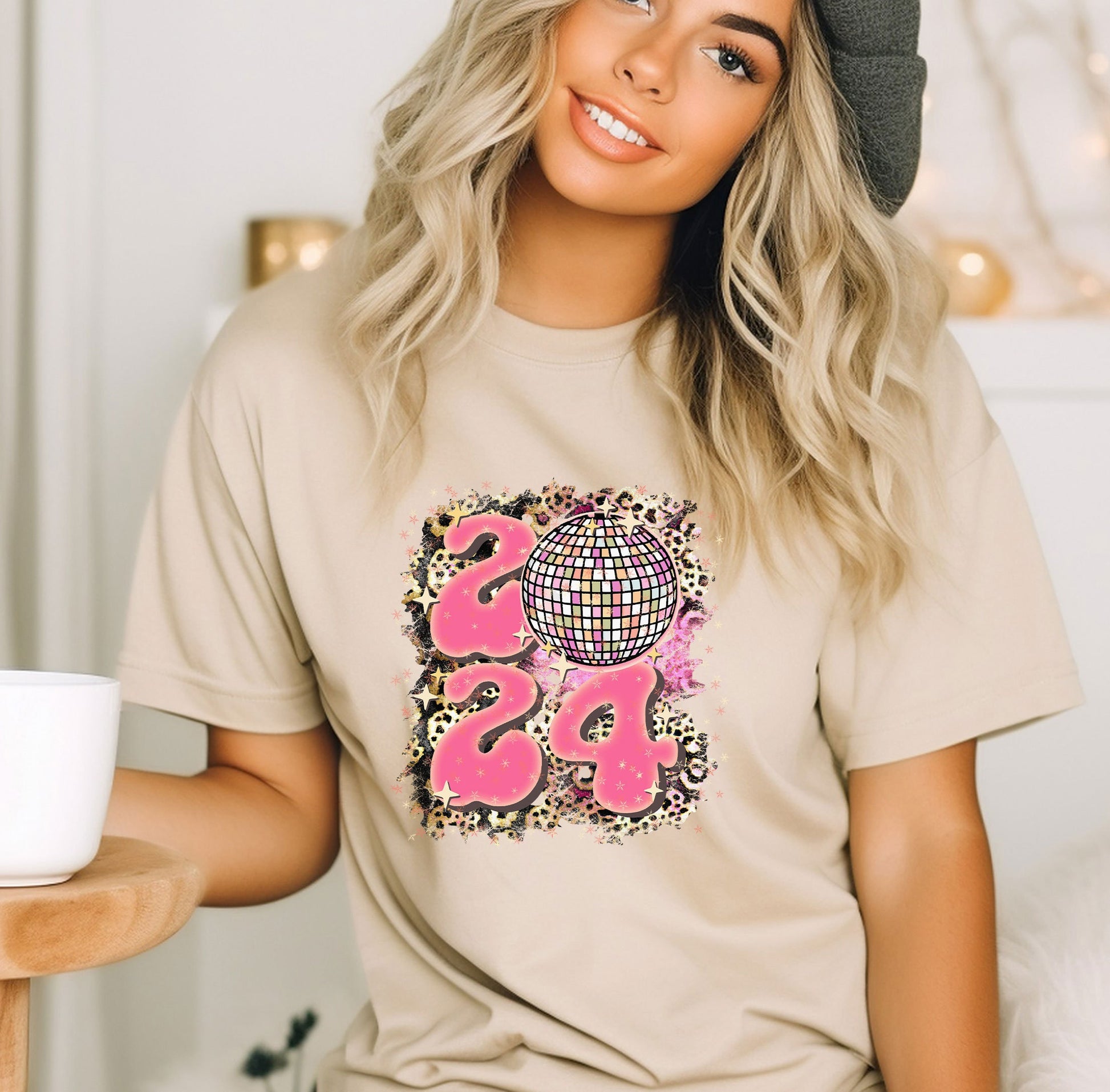 a woman wearing a t - shirt with a bear on it