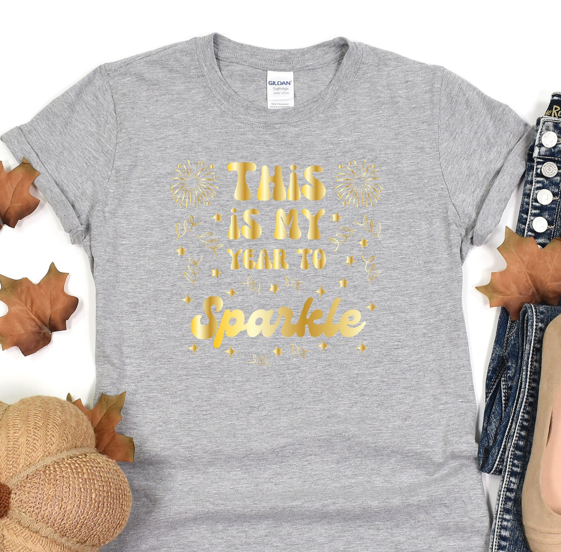 a t - shirt that says this is my first to sparkle