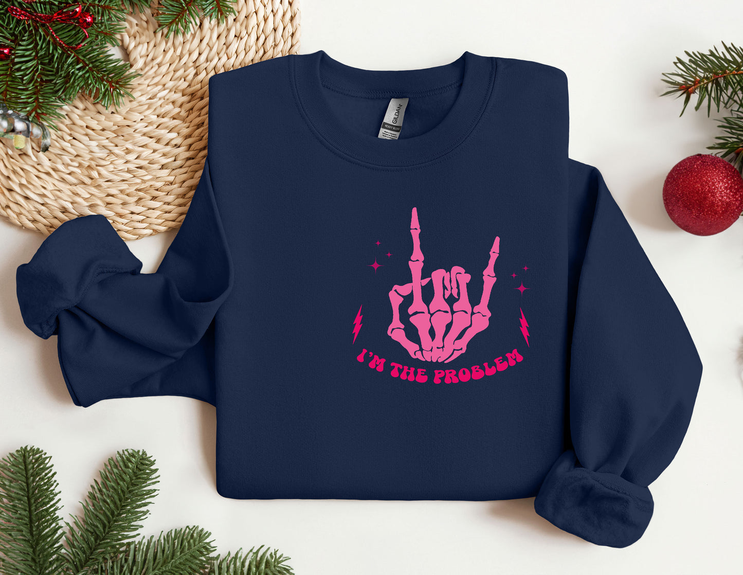 a blue sweatshirt with a pink hand print on it