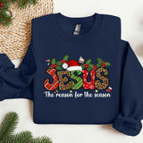 a christmas sweater with the word jesus on it