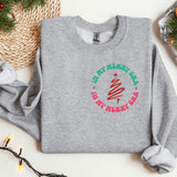 a gray sweatshirt with a christmas tree on it
