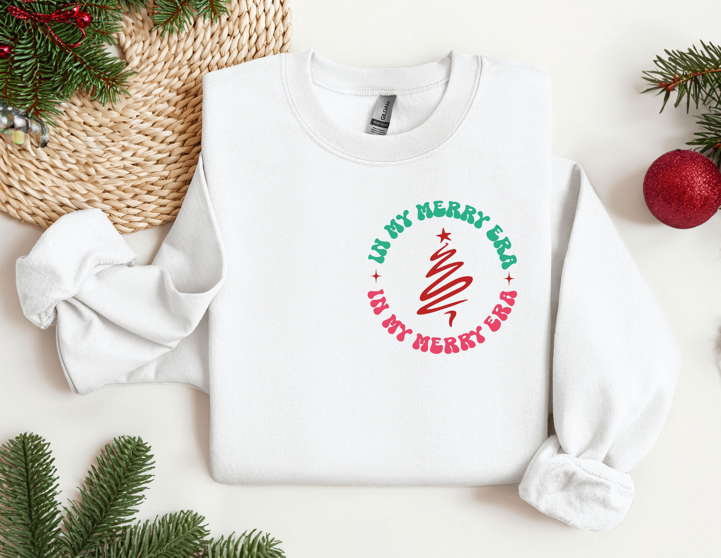 a white sweatshirt with a christmas tree on it