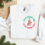 a white sweatshirt with a christmas tree on it