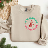 a sweater with a christmas tree on it