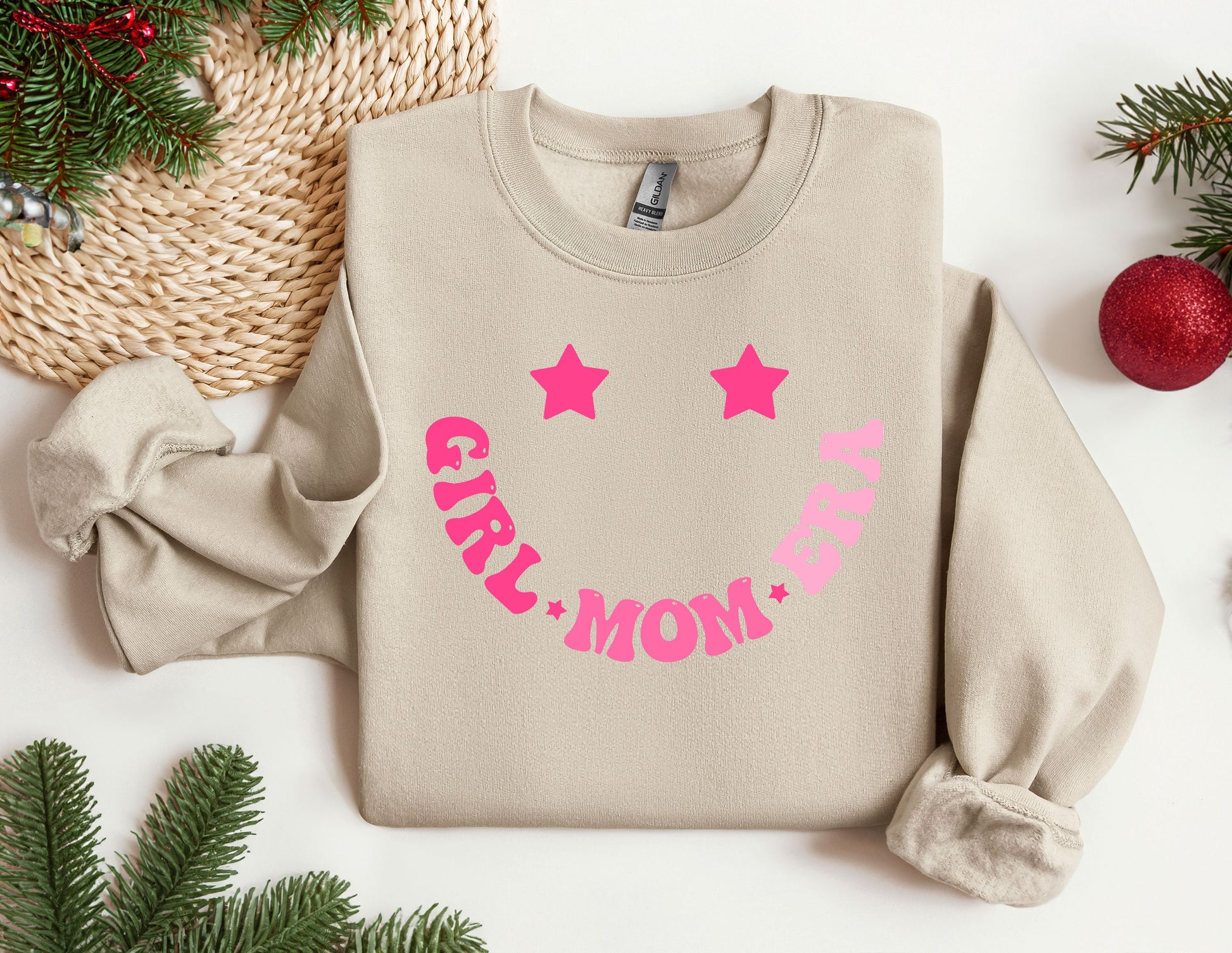 a sweater with the words girl mom on it