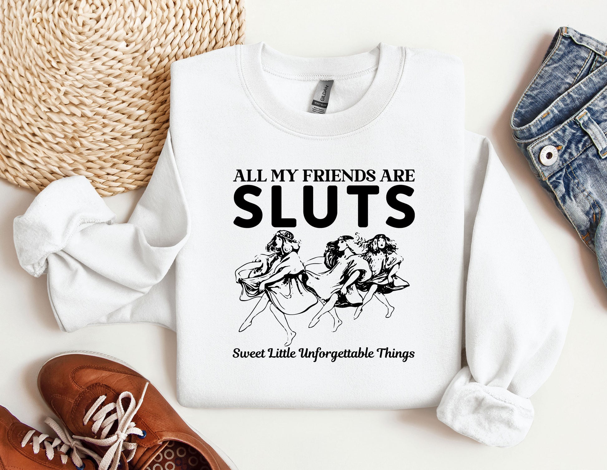 a white sweatshirt with a horse and rider saying all my friends are sluts