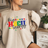 a woman wearing a sweatshirt that says big bright energy