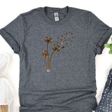 a t - shirt with a dandelion design on it