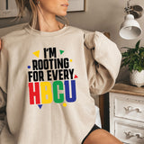 a woman wearing a sweatshirt that says i'm rooting for every hbc