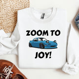 a blue car with the words zoom to joy printed on it