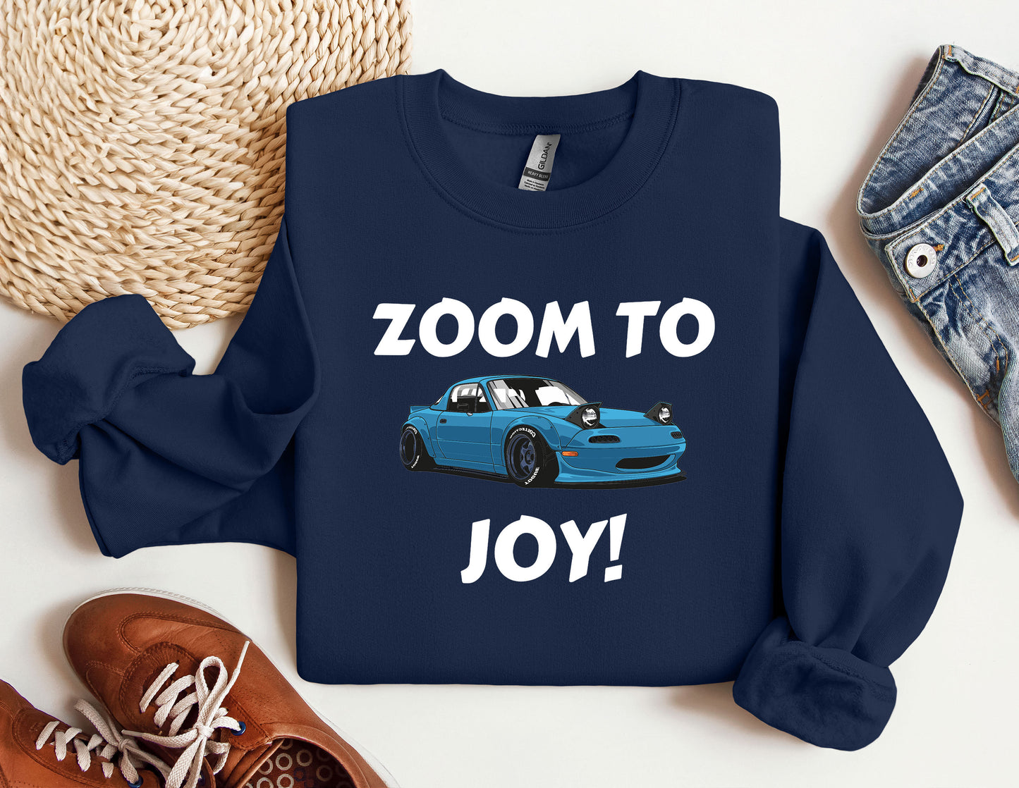 a blue car with the words zoom to joy on it